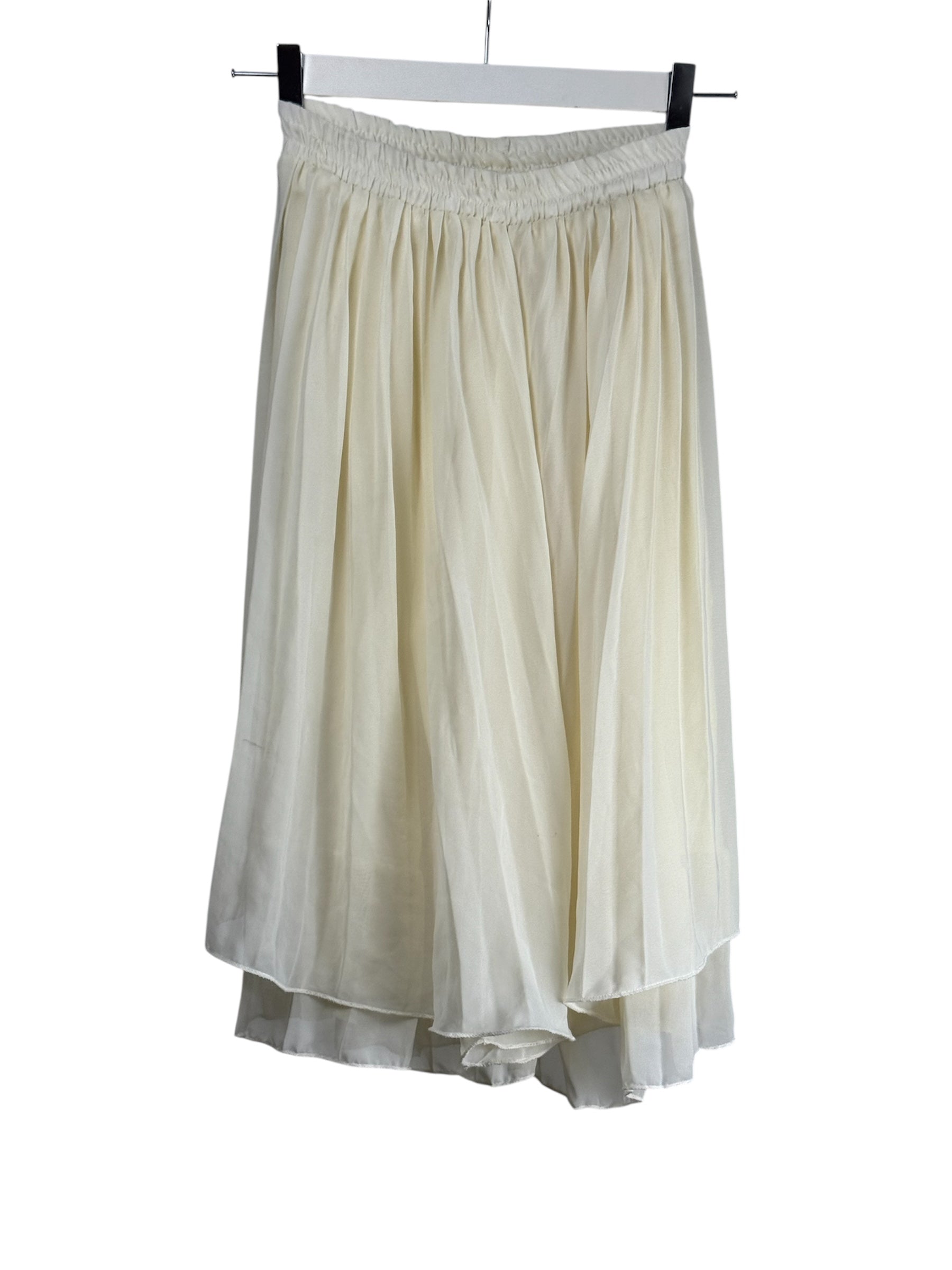 Falda plisada crema