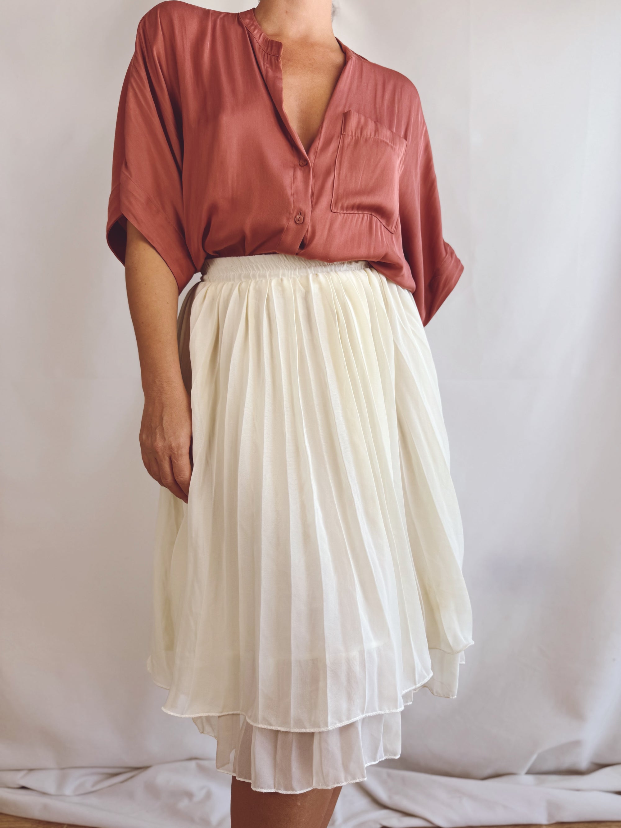 Falda plisada crema