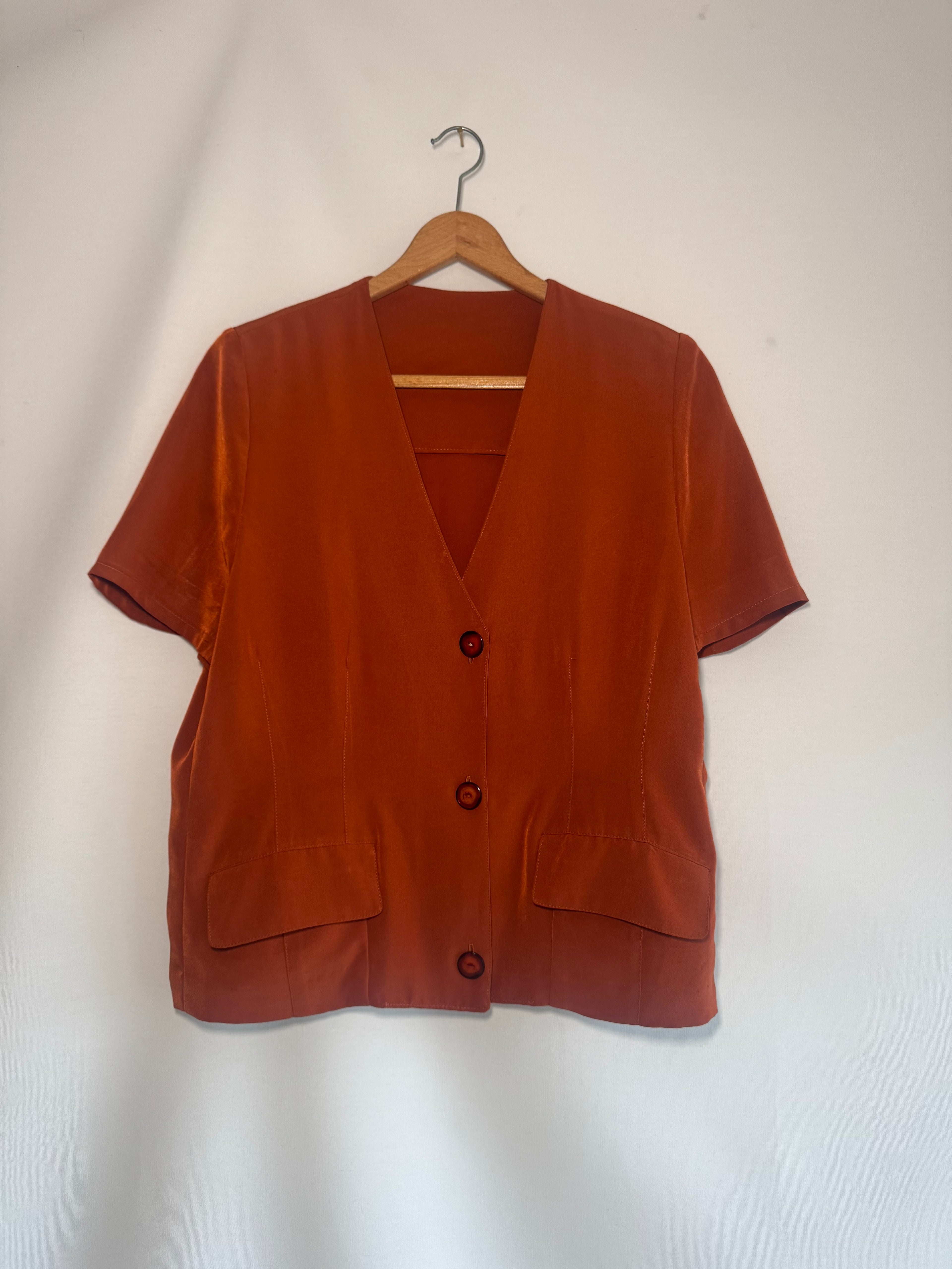 Blusa vintage con hombreras