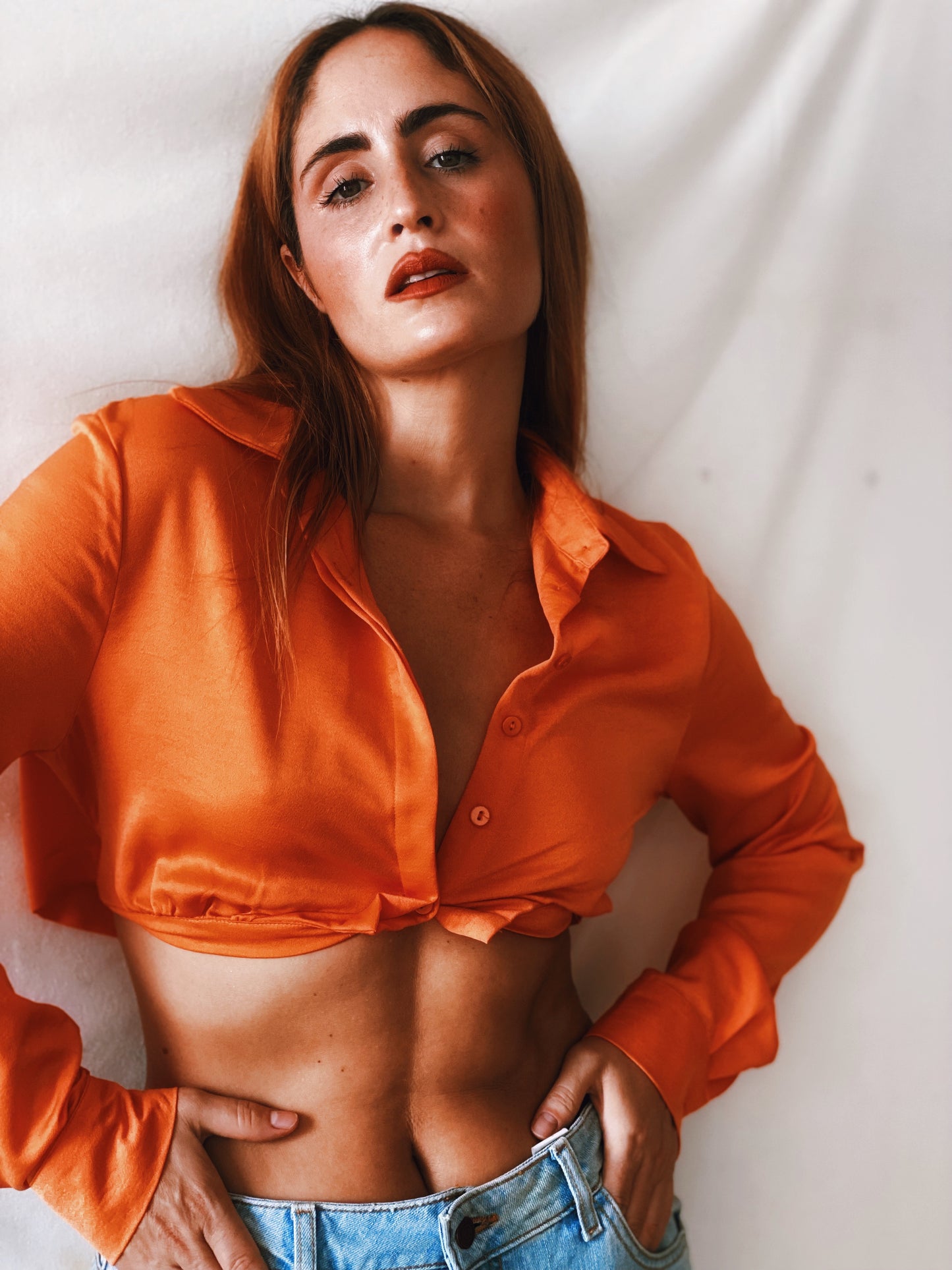 Orange satin blouse