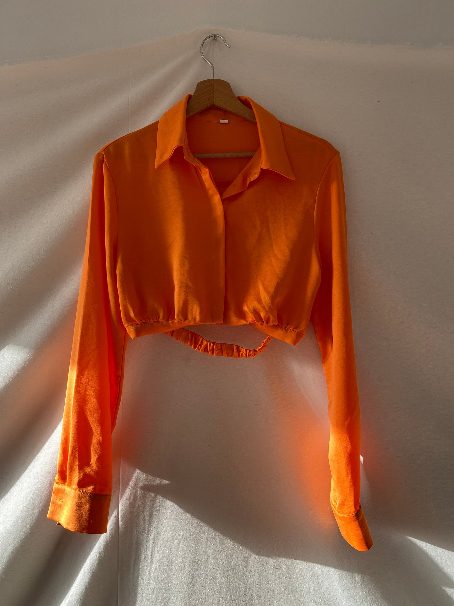 Orange satin blouse