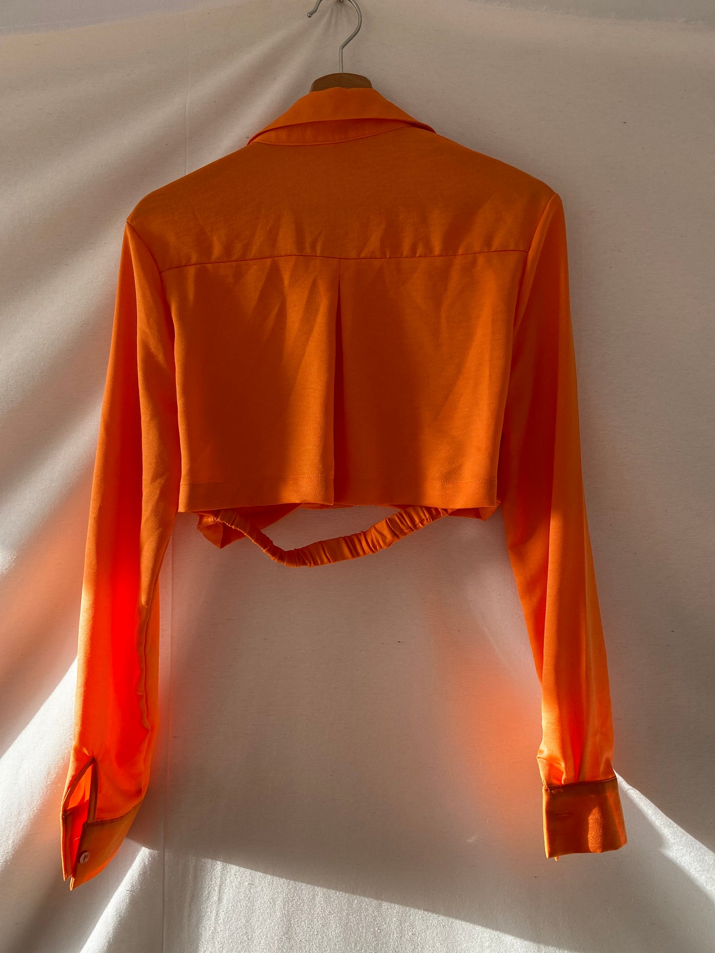 Orange satin blouse